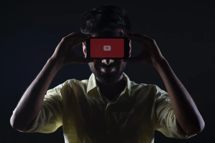 Holding Up Phone With YouTube