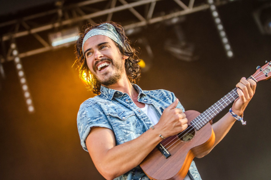 Musician Playing His Guitar On Stage