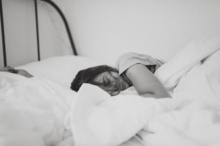 Woman In Bed Sleeping Peacefully